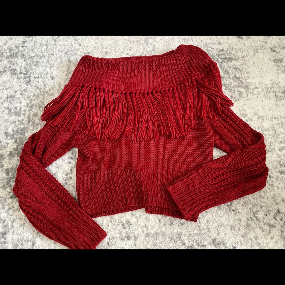 Red off the shoulder fringe sweater